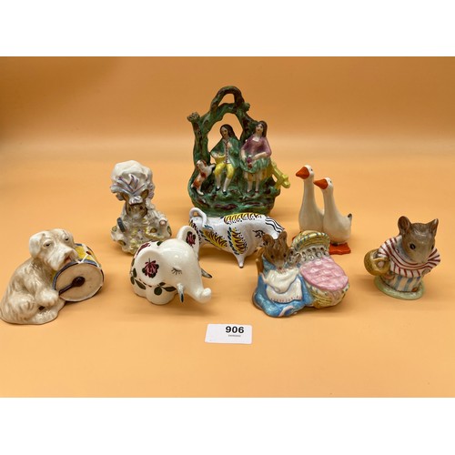 906 - Collection of porcelain items to include Beswick dog and drum, Plichta Elephant, Gold stamped Beswic... 