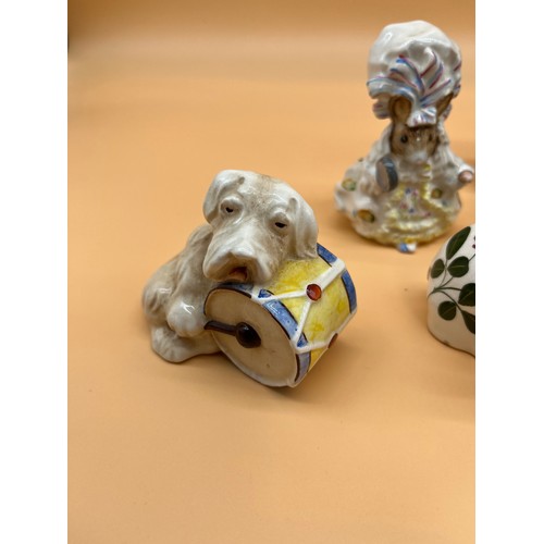 906 - Collection of porcelain items to include Beswick dog and drum, Plichta Elephant, Gold stamped Beswic... 