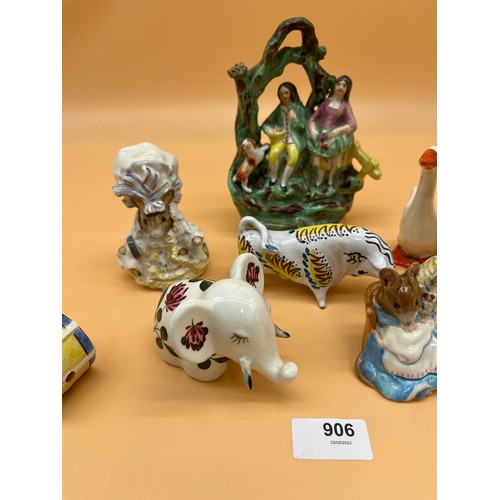 906 - Collection of porcelain items to include Beswick dog and drum, Plichta Elephant, Gold stamped Beswic... 