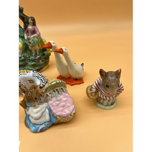 906 - Collection of porcelain items to include Beswick dog and drum, Plichta Elephant, Gold stamped Beswic... 