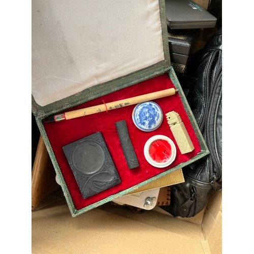 220A - Box of odds to include Two vintage first aid boxes and contents, Chinese calligraphy set and leather... 