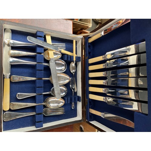 224A - Large collection of boxed canteens of cutlery to include antique mahogany canteen chest- empty