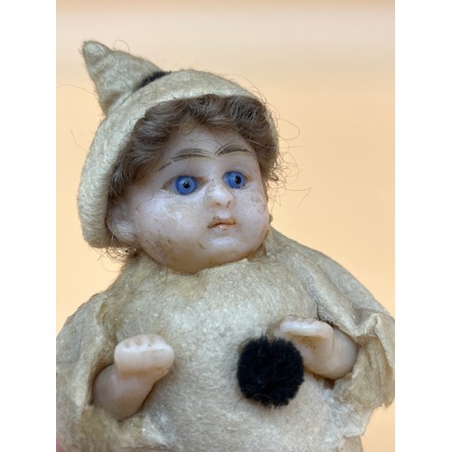 8 - Antique wax faced miniature doll, fitted with glass eyes and hair. Originally gifted with sweets to ... 