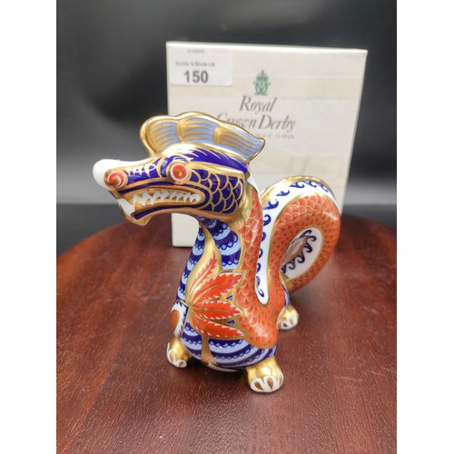 150 - Royal crown Derby Dragon Paperweight with stopper and box .