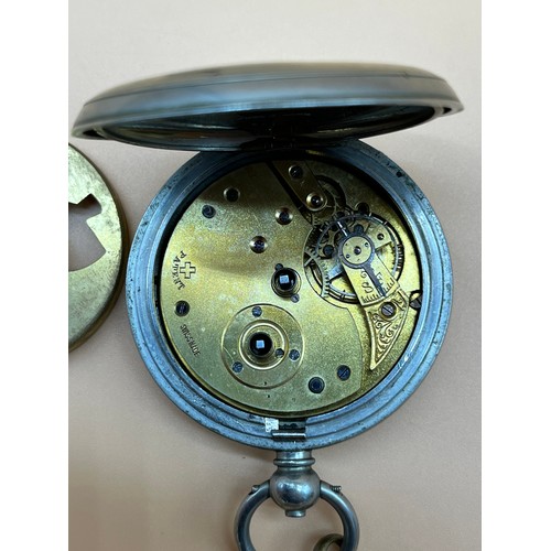 22 - Antique pocket watch fitted within a nickel case, Enamel face. Swiss made New Magnetic. Comes with a... 