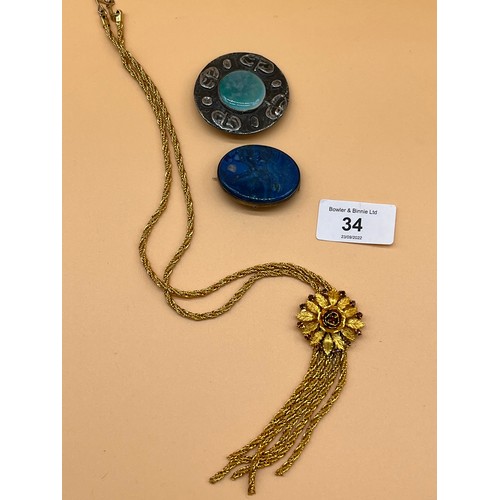 34a - Arts and Crafts Ruskin brooch, together with a silver and blue agate stone brooch. Also in the lot i... 