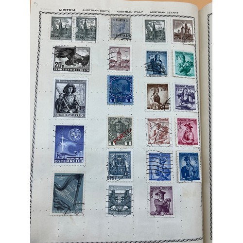 63 - The Triumph stamp album containing a large quantity of stamps from around the world. [Will post]