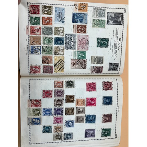 63 - The Triumph stamp album containing a large quantity of stamps from around the world. [Will post]