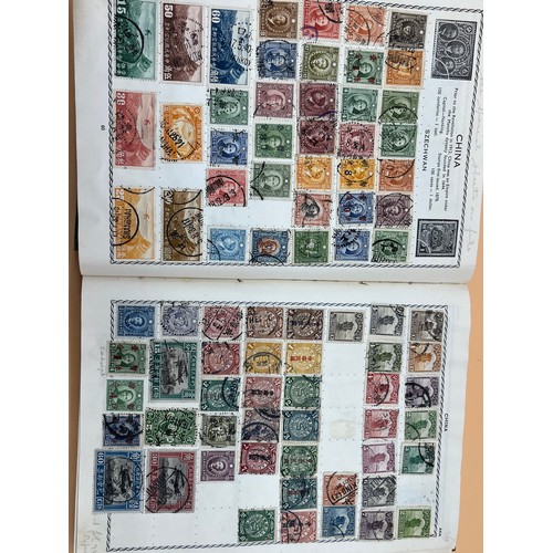 63 - The Triumph stamp album containing a large quantity of stamps from around the world. [Will post]