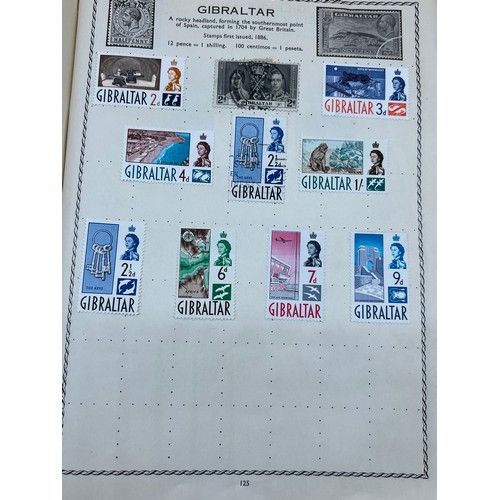 63 - The Triumph stamp album containing a large quantity of stamps from around the world. [Will post]