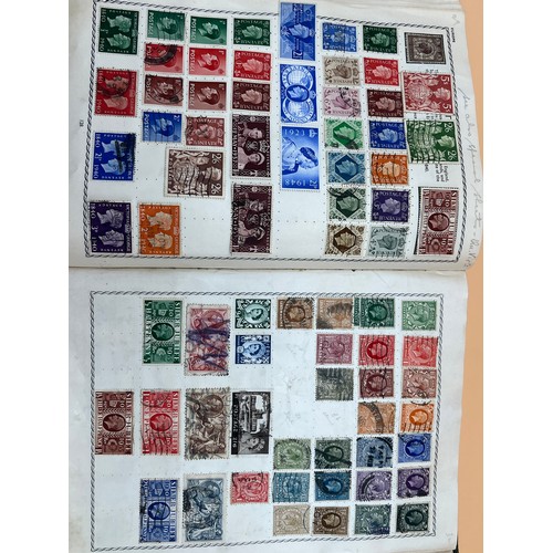 63 - The Triumph stamp album containing a large quantity of stamps from around the world. [Will post]