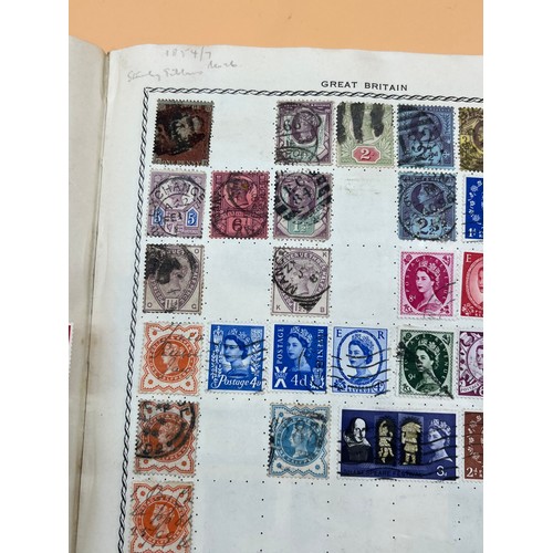 63 - The Triumph stamp album containing a large quantity of stamps from around the world. [Will post]