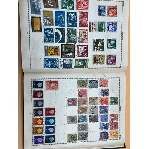 63 - The Triumph stamp album containing a large quantity of stamps from around the world. [Will post]