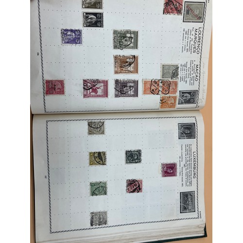 63 - The Triumph stamp album containing a large quantity of stamps from around the world. [Will post]