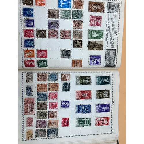 63 - The Triumph stamp album containing a large quantity of stamps from around the world. [Will post]