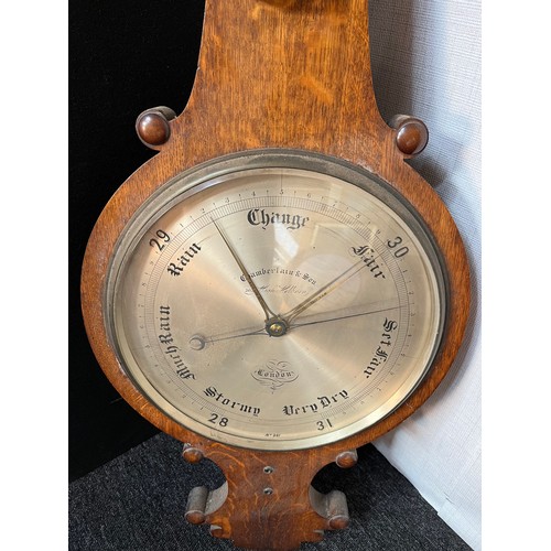 83 - Large Antique Camberlain & Son London oak cased barometer and thermometer [Mercury] [121cm in length... 