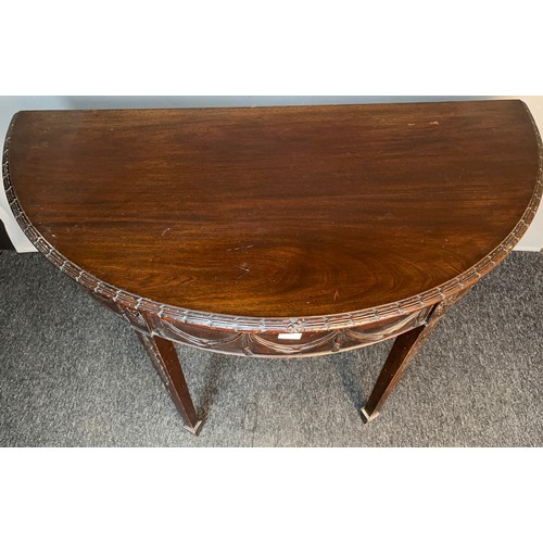 94 - Antique demi lune table, the half-moon top above a moulded frieze, raised on square tapered legs. [7... 