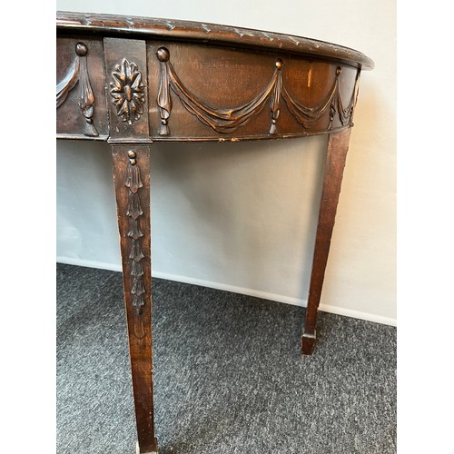 94 - Antique demi lune table, the half-moon top above a moulded frieze, raised on square tapered legs. [7... 