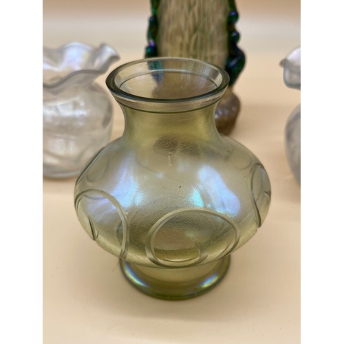 174 - Four pieces of Vaseline/ opalescent glass vases. Includes Loetz style tall vase. [21cm high]