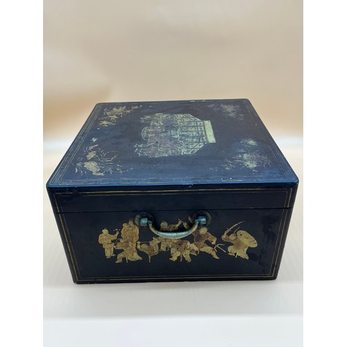 48 - Antique Chinese lacquered and gilt panel painted tea box. Panels depict various group figures of som... 