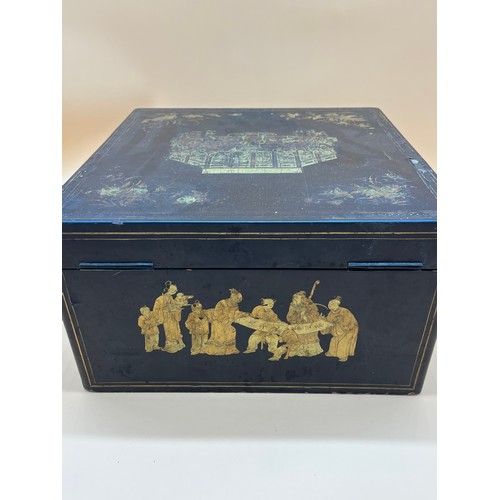 48 - Antique Chinese lacquered and gilt panel painted tea box. Panels depict various group figures of som... 