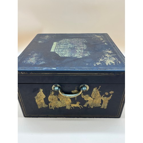 48 - Antique Chinese lacquered and gilt panel painted tea box. Panels depict various group figures of som... 