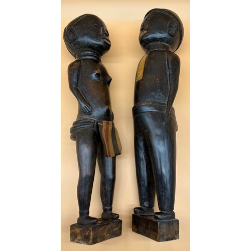 550 - Two Antique African Tribal hand carved figures. Him and her figures. Lady designed with weaved cloth... 