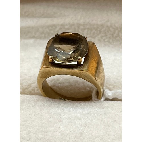 6A - 9ct yellow gold and Smokey quartz ring. [Ring size G] [4.87grams]