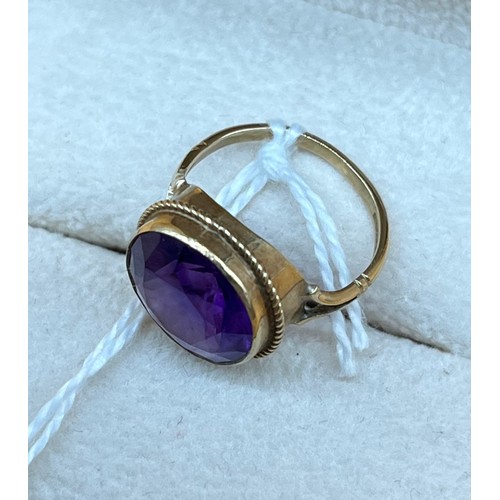 7A - 9ct yellow gold and large amethyst set ring. [Ring size F] [2.69grams]