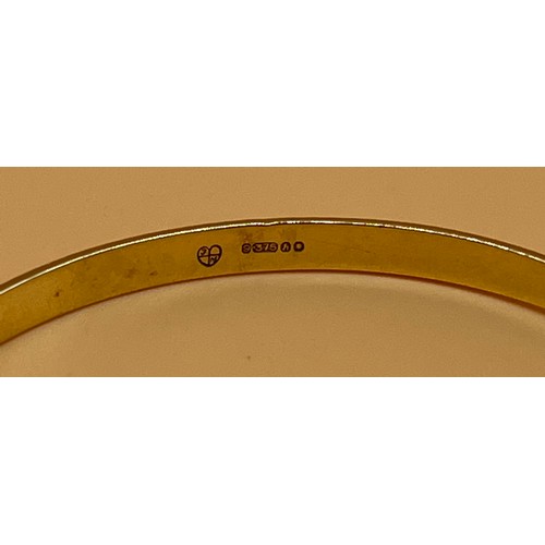 547 - 9ct yellow gold bangle. [8.99grams]