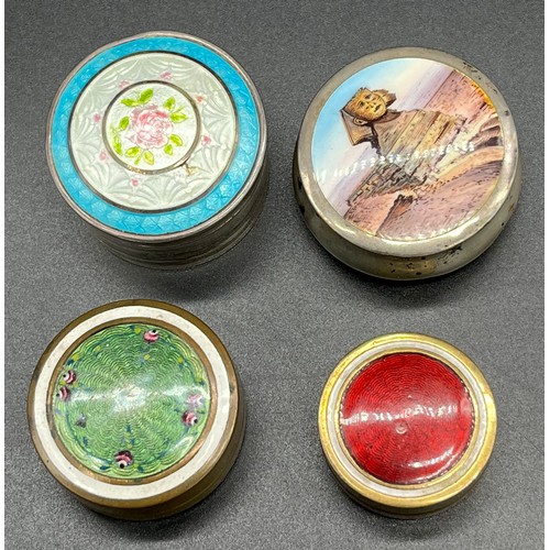 27 - Four various enamel lidded pill boxes. 800 grade silver and Egyptian scene enamel lid, Sterling silv... 