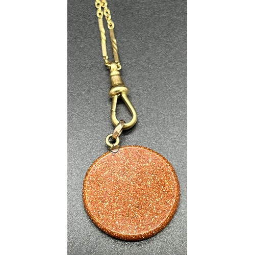 505 - 18ct yellow gold unusual necklace. Comes with a goldstone pendant. [Chain6.40grams]