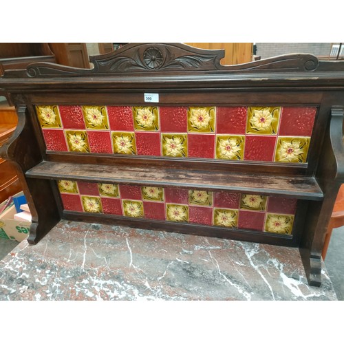 300 - Victorian Wash stand, the art nouveau themed tile back with open shelf above a marble surface, two d... 