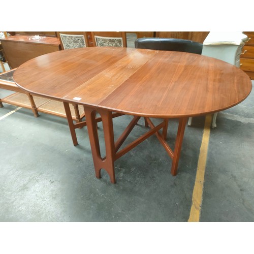 284 - Mid Century Drop leaf dinning room teak table .