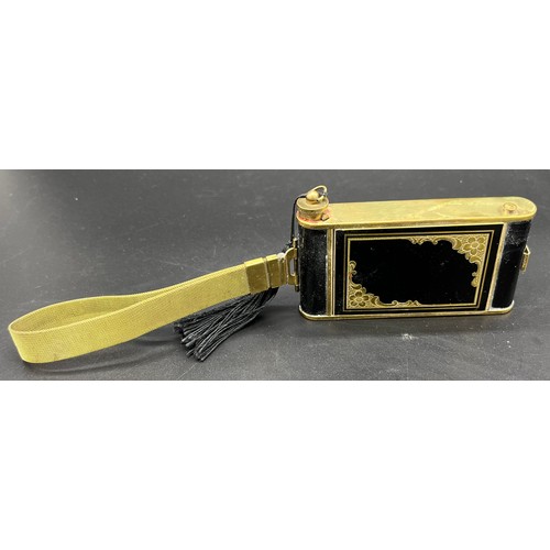 35 - Vintage Camera shaped ladies compact case. Black/ gilt metal design. Fitted with cigarette dispenser... 