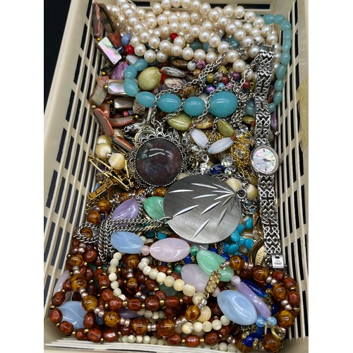 40 - Small basket of costume jewellery to include brooches, necklaces and watch. Together with a vintage ... 