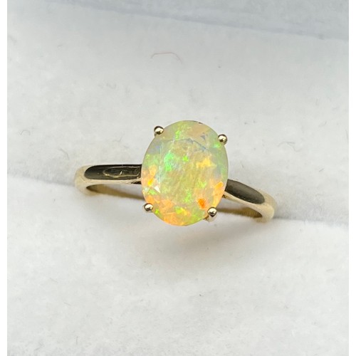 47 - 10ct yellow gold & opalescent style cut stone ring. [2.36grams] [Ring size R]