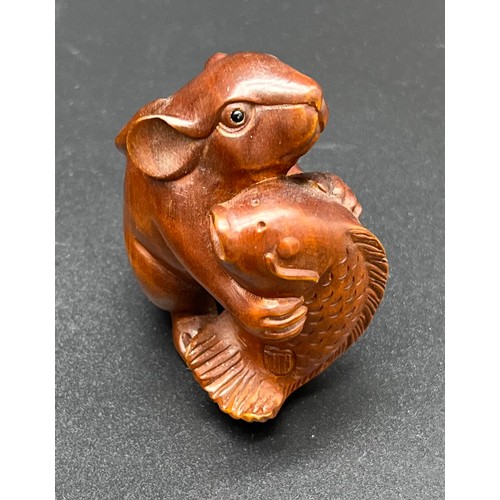 61 - Hand carved Japanese Netsuke sculpture of a Mouse holding a koi carp. [5.2cm high]