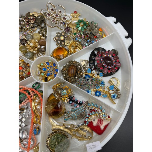 72 - Collection of vintage costume brooches and necklaces.