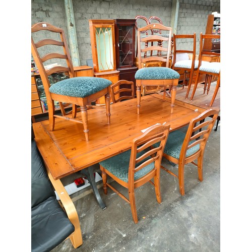 329 - Heavy modern metal based pine topped table with 6 chairs