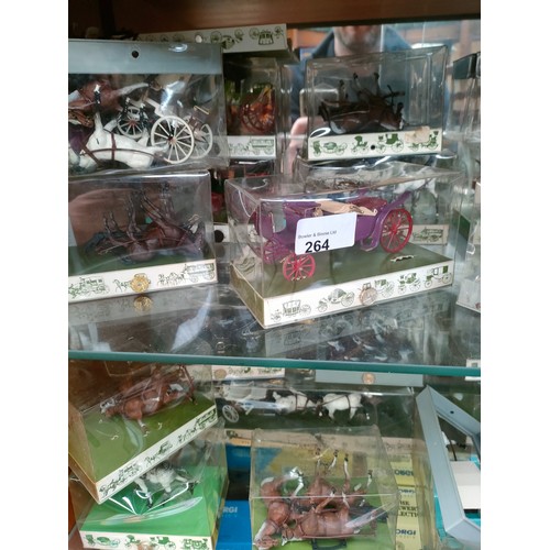 264 - 2 shelf s of horse and carriage models