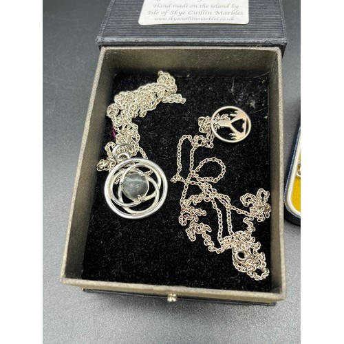 91 - A Quantity of silver jewellery to include Celtic design necklace, Ornate Sterling silver cross penda... 