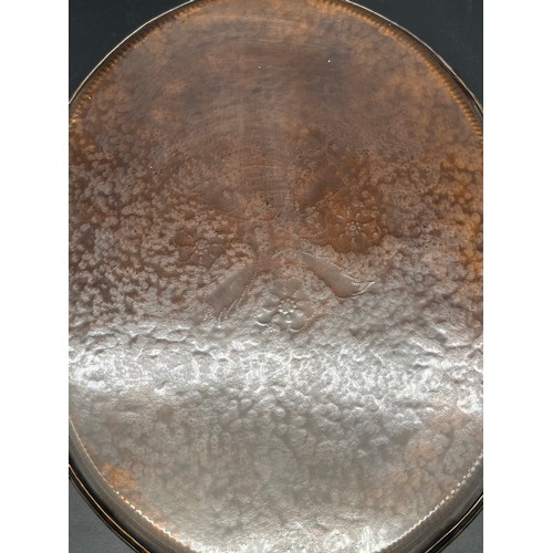 95 - Arts & Crafts era copper hammered tray, detailed with pewter flower design inlay. Marked DG. [37X28C... 