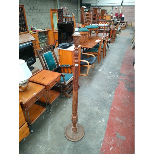 351 - Heavily carved eastern themed standard floor lamp