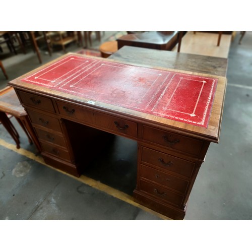 239 - Reproduction Leather topped knee hold desk .