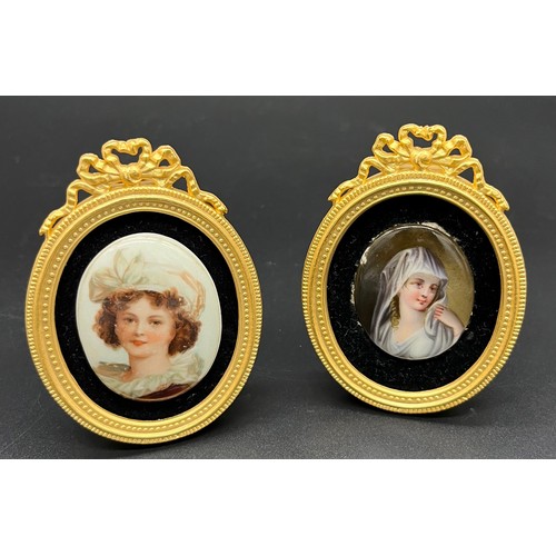 118 - Two antique German printed enamel plaques depicting portraits of women within gilded frames. [8cm hi... 