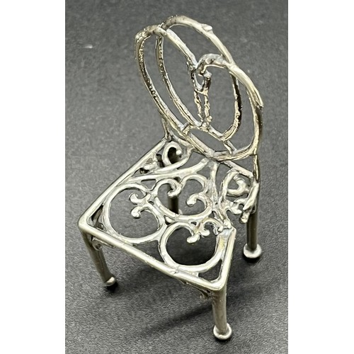 112 - Vintage silver Georgian style miniature chair model. [5.5cm high]