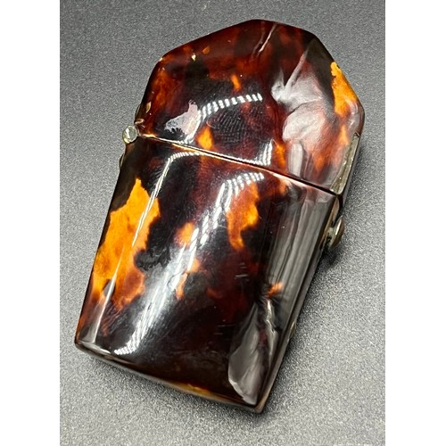 102 - Antique 19th century tortoise shell case containing perfume bottle. [6.4cm in length]