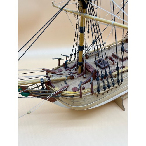 138 - Large Hand built Galleon ship fitted with rigging. Comes with wooden stand. [63x80cm]