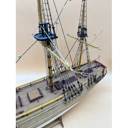 138 - Large Hand built Galleon ship fitted with rigging. Comes with wooden stand. [63x80cm]